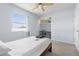Bright bedroom featuring a bed, built in shelving and desk at 330 Brandy Wine Dr # 330, Largo, FL 33771