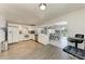 Spacious, open concept kitchen with white cabinets and stainless steel appliances at 3381 Conway Blvd, Port Charlotte, FL 33952