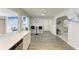 Bright kitchen with breakfast bar and stainless steel dishwasher at 3381 Conway Blvd, Port Charlotte, FL 33952