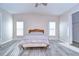 Bright bedroom featuring neutral walls and new flooring at 37530 Corey Lewis Ave, Zephyrhills, FL 33541