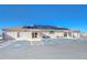 Well-maintained community building with solar panels and accessible parking for community members at 37530 Corey Lewis Ave, Zephyrhills, FL 33541