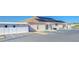 Community building with solar panels, accessible parking, and well-maintained exterior in a vibrant community at 37530 Corey Lewis Ave, Zephyrhills, FL 33541