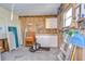 Organized garage with ample storage space, featuring cabinets, work surfaces, and tool organization at 37530 Corey Lewis Ave, Zephyrhills, FL 33541