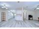 Expansive open-concept home with seamless flow between kitchen, dining, and living areas at 37530 Corey Lewis Ave, Zephyrhills, FL 33541