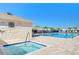 Spa and pool with brick pavers, next to community pool rules at 37530 Corey Lewis Ave, Zephyrhills, FL 33541