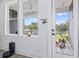 Sunlit balcony view featuring a pet and indoor plants adding natural light to the home at 41 29Th N St, St Petersburg, FL 33713