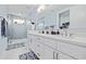 Modern bathroom featuring a double sink vanity, spacious glass shower, and contemporary finishes for a luxurious feel at 41 29Th N St, St Petersburg, FL 33713