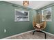 Stylish bedroom with a unique hanging chair, cozy lighting, and comfortable ambiance at 4750 Burlington N Ave, St Petersburg, FL 33713