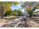 Charming home nestled among mature trees and lush landscaping at 4750 Burlington N Ave, St Petersburg, FL 33713