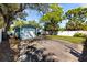 Charming single-story home with a one-car garage and a cozy outdoor seating area at 4750 Burlington N Ave, St Petersburg, FL 33713