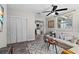 Bright living room featuring stylish decor, wood floors, and access to an open kitchen at 4750 Burlington N Ave, St Petersburg, FL 33713