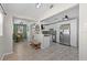 Open concept living space featuring a modern kitchen, cozy seating, and stylish decor at 4750 Burlington N Ave, St Petersburg, FL 33713