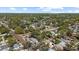 An aerial view of the neighborhood showcasing an abundance of lush mature trees at 4750 Burlington N Ave, St Petersburg, FL 33713