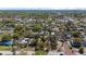 Aerial shot above a lush neighborhood with brick-paved roads and well-maintained houses at 4750 Burlington N Ave, St Petersburg, FL 33713