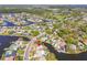 Aerial view showcasing the property nestled in a community with access to canals and waterways at 5167 Venetian Ne Blvd, St Petersburg, FL 33703