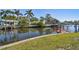 Community with boat dock along canal with waterfront views at 5167 Venetian Ne Blvd, St Petersburg, FL 33703