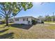 Charming single-story home with a well-maintained lawn and mature trees at 5167 Venetian Ne Blvd, St Petersburg, FL 33703