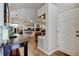 Open foyer with views into the living room and kitchen, featuring light floors and a bright interior at 592 Deer W Run, Palm Harbor, FL 34684