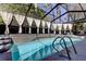 Beautiful screened pool area with ladder, perfect for cooling off on hot summer days in your backyard at 592 Deer W Run, Palm Harbor, FL 34684