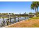 Picture of waterfront property with a private dock, perfect for boating and enjoying the canal views at 8706 Tahiti Ln, Tampa, FL 33615