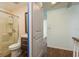 Modern bathroom features a glass shower and updated vanity with wood cabinets at 9037 Pebble Creek Dr, Tampa, FL 33647