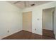 The bedroom features hardwood floors, closet and door to hallway at 9037 Pebble Creek Dr, Tampa, FL 33647