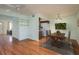 Dining area with hardwood floors, adjacent to closet and kitchen at 9037 Pebble Creek Dr, Tampa, FL 33647