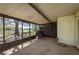 Enclosed patio with view of lake and trees at 9037 Pebble Creek Dr, Tampa, FL 33647