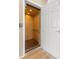 Interior elevator with light wood panels and flooring at 94 S Highland Ave # 2402, Tarpon Springs, FL 34689