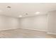 Spacious and empty room with neutral paint and wood floors at 94 S Highland Ave # 2402, Tarpon Springs, FL 34689