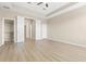 Spacious empty room with multiple closets and doors at 94 S Highland Ave # 2402, Tarpon Springs, FL 34689