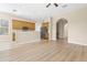 Spacious kitchen area featuring wood cabinets, stainless steel appliances, and an open floor plan at 94 S Highland Ave # 2402, Tarpon Springs, FL 34689