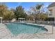 A tranquil community pool area, perfect for relaxation and recreation at 94 S Highland Ave # 2402, Tarpon Springs, FL 34689