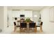 Bright dining area adjacent to the kitchen, complete with modern decor at 10578 Gable Dig Loop, San Antonio, FL 33576