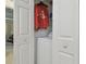 Conveniently located laundry closet with a washer and some shelving at 11240 Windsor Place Circle Cir, Tampa, FL 33626