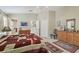 Spacious main bedroom with two closets, a ceiling fan, and neutral carpet at 11240 Windsor Place Circle Cir, Tampa, FL 33626
