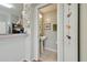 A tidy powder room with pedestal sink and decorative accents at 11240 Windsor Place Circle Cir, Tampa, FL 33626