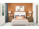 Cozy bedroom featuring a well-made bed, matching nightstands, and natural light at 11853 Sparkling Topaz Cv, Parrish, FL 34219