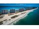 High-rise condo buildings on white sand beach with lush landscaping at 1270 Gulf Blvd # 506, Clearwater Beach, FL 33767