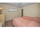Bedroom with beds and hardwood floor at 1270 Gulf Blvd # 506, Clearwater Beach, FL 33767