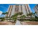 Beautiful high-rise condo with multiple balconies and tropical landscaping at 1270 Gulf Blvd # 506, Clearwater Beach, FL 33767
