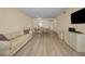 Spacious living area with a dining area, flat screen TV, and comfortable seating at 1270 Gulf Blvd # 506, Clearwater Beach, FL 33767