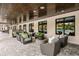 Comfortable outdoor lounge area with plush seating and serene views of the community at 16969 Falling Waters Ct, Land O Lakes, FL 34638