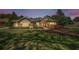 Charming single-story home with stone accents, lush landscaping, and a well-manicured lawn at 19719 Prince Benjamin Dr, Lutz, FL 33549