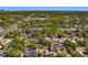 An aerial view of a neighborhood with tree-lined streets, showing the property's location at 2340 Kingston S St, St Petersburg, FL 33711