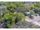 See this property, located near homes and close to the street, from this lush, green, aerial shot at 2340 Kingston S St, St Petersburg, FL 33711