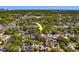 An aerial view highlights property location within a neighborhood with mature trees and sidewalks at 2340 Kingston S St, St Petersburg, FL 33711