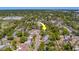 An aerial view highlights property location within a neighborhood with mature trees and sidewalks at 2340 Kingston S St, St Petersburg, FL 33711