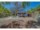 A full view of the home from the expansive backyard at 2340 Kingston S St, St Petersburg, FL 33711