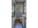 Charming bathroom featuring hardwood floors, ample lighting, and modern fixtures at 2340 Kingston S St, St Petersburg, FL 33711